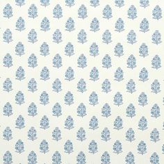 a blue and white wallpaper with small trees on it