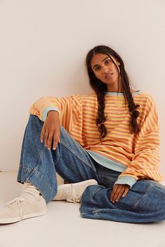 So cool and classic, this timeless crewneck is featured in an oversized, slouchy silhouette and staple striped print with contrasting hems for added dimension. **Fit:** Relaxed, oversized fit **Features:** Crew neckline, dropped shoulders, contrast hems **Why We | Classic Striped Oversized Crewneck by We The Free at Free People in Orange, Size: L Free People Sweatshirt, Colorful Comfy Outfits, Trendy Jumpers, Outfits With Striped Shirts, Oversized Shirt Outfit, Oversized Crewneck, Casual Long Sleeve Shirts, White Lace Top, Oversized Sweatshirt