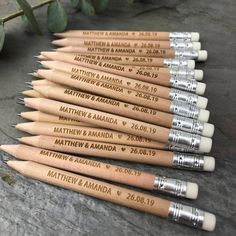 six personalized wooden pencils with names on them