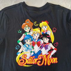 Brand New Never Worn Black Sailor Moon Shirt (Whole Group On The Back) Symbols On The Front Fits Like A Medium But Is A Large Black Cute Shirt For Streetwear, Cute Black Shirt For Streetwear, Cute Black Crew Neck Shirt, Vans Long Sleeve Graphic Print Top, Black Short Sleeve Fandom Top, Cute Black Anime Print Tops, Black Vans Tops With Graphic Print, Vans Black Tops With Graphic Print, Vans Black Top With Graphic Print