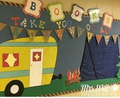 a school bus themed bulletin board is shown