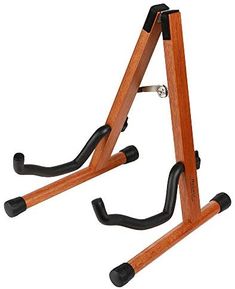 a pair of wooden stands with black handles on each side and one leg bent down