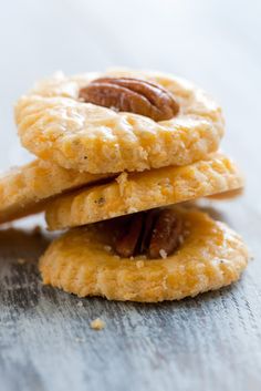 three pecan cookies stacked on top of each other