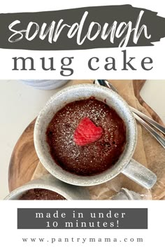 a mug cake with a strawberry in it and the words sourdough mug cake made in under 10 minutes