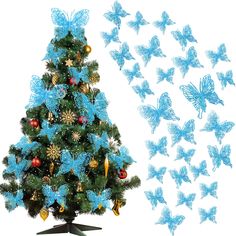 a christmas tree with blue butterflies flying around it