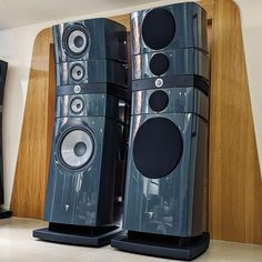 two speakers sitting on top of each other