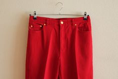 "Ralph Lauren Pants Red Pants Red Women's Pants Red Denim Pants Denim Trousers Red Ralph Lauren Denim Pants Jeans Pants High Waist Shown on model M/L Label size: 12 Measurements(lying flat): Waist: 16.5\"/ 42 cm Length: 41\"/ 104 cm Inseam: 29.5\"/ 75 cm From crotch to waist line: 12\"/ 30.5 cm Hips: ~20.5\"/ 52 cm Condition: Great Vintage Condition Material: 99% cotton,1% lycra Please check measurements to insure a proper fit. Remember to allow yourself some extra room for movement. You can com Red Cotton Bottoms With Belt Loops, Red Wide Leg Cotton Jeans, Red Cotton Jeans With Pockets, Red High Rise Jeans With Pockets, Red High Waist Cotton Jeans, Red Full-length Jeans For Spring, Red Full Length Cotton Jeans, Red High Waist Jeans With Five Pockets, Red Cotton Pants With Belt Loops