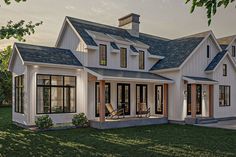 this is an artist's rendering of a house in the country style with porches