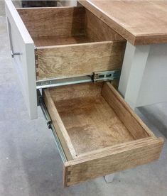 an open drawer on top of a desk