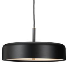 a black pendant light hanging from the ceiling with an oval shade and two lights on each side