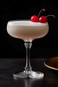 An inviting Grappa Sour cocktail with cherry garnish and lemon slice showcases its delicious combination of flavors. This pin captures the essence of the Grappa Sour recipe using vibrant colors to entice cocktail enthusiasts. Egg White Substitute, Sour Drink, Strong Cocktails, Simple Syrup Recipes, Sour Cocktail, Whiskey Sour, Sour Taste, Vegan Eggs, Syrup Recipe