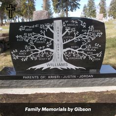 a family memorial is shown in the park