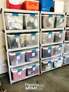 several plastic containers are stacked on top of each other in this garage storage area with the words organizing moms above them