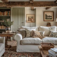 a living room filled with lots of furniture and decor