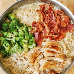 the meal is prepared and ready to be eaten in the pan on the table with utensils