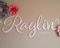 the name raylin is made out of paper flowers