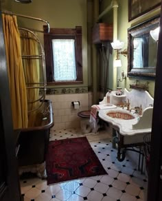 a bathroom with a sink, mirror and rug in it