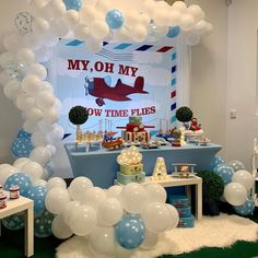 an airplane themed birthday party with balloons and decorations