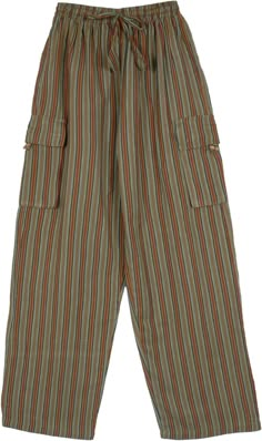 A jungle-inspired green and brown striped bohemian unisex pants in soft hand-loomed cotton fabric.  These hippie pants feature an elastic waist with a flexible drawstring and 5 functional pockets (2 inner side pockets, 2 outer pockets, 1 back pocket). #tlb #SplitSkirtsPants #Pocket #vacationclothing #Striped #bohemianfashion #StreetPants #CasualPants #NepalPants Bohemian Pants, Green Clothing, Pants Pocket, Hippie Pants, Hippie Look, Unisex Pants, Trendy Skirts, Pants Green, Lightweight Pants