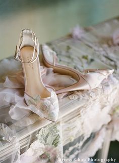 a pair of shoes sitting on top of a table