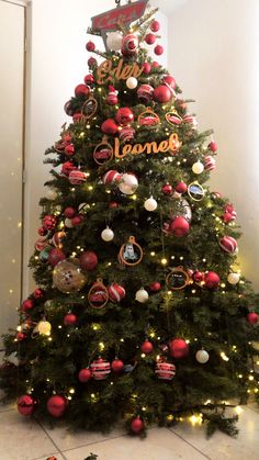 a christmas tree decorated with ornaments and lights