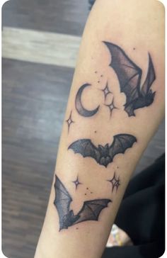 a couple of bats that are on the arm