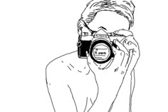 a person holding a camera up to their face