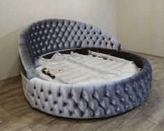 a round bed made out of an old mattress