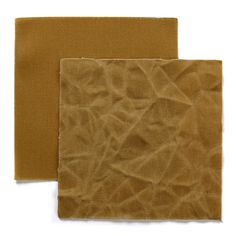 two pieces of brown fabric on top of each other, one is folded and the other has