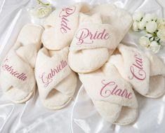 the bride and groom slippers are laid out