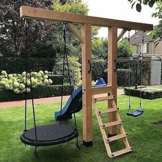 a wooden swing set in the middle of a yard with text overlay that reads garden art