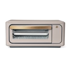 a toaster oven sitting on top of a white counter