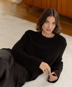 Cashmere Amelia Crewneck Black Oversized and luxuriously soft, this 100% cashmere knit features a chainette yarn that gives this sweater a chunky yet lightweight look. With a straight body, this knit looks great over a fluid bottom like the Pleated Skirt or Demi Pant—or the Relaxed Army Pant for a dressed-down take. Fall In The South, Black Cashmere Sweater, Army Pants, Jenni Kayne, Womens Cashmere, Black Sweater, Mens Activewear, Cashmere Sweater, Party Dresses For Women