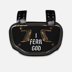 a black and gold belt with the words i fear god written on it in white