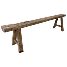 an old wooden bench sitting against a white background