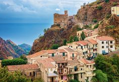 an old village on the side of a mountain