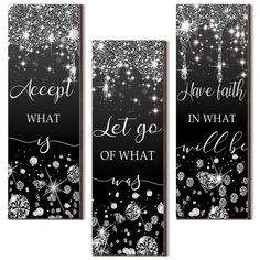 three black and white wall hangings with silver glitter on the bottom, one saying accept what