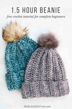 two knitted hats with pom - poms on the top, one blue and one grey