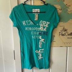 Nwt Aeropostale V Neck T Shirt Size Medium Blue With Logo 100% Cotton Pit To Pit About 17 Inches Top To Bottom About 26 Inches No Issues Found Aeropostale, Medium Blue, Dream Closet, Neck T Shirt, V Neck T Shirt, Blue White, Blue And White, Womens Tops, Tops & Tees