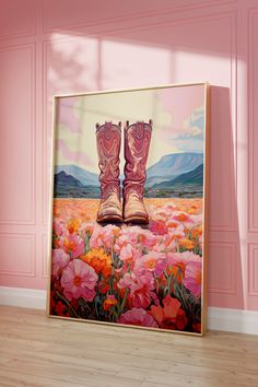 a pink room with a painting of boots on the floor and flowers in the background