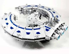 a model of a space ship with blue and white details