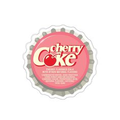 a bottle cap with the words cherry coke on it