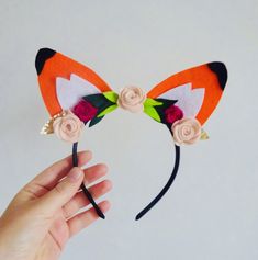 These fox ear headbands are a beautiful way to celebrate the fox animal! Pair them with an orange or brown top for a quick and easy fox costume.  These fox ears are great for parties, festivals, hen nights, or even World Book Day! DETAILS: 🧡 I use a beautiful wool blend felt fabric that's vibrant and soft.  🧡 There are 2 designs to choose from, ears with flowers, or ears with leaves.  CUSTOM ORDERS ARE AVALIABLE IF YOU WOULD LIKE 🧡 Wear these fox ears to a party or a festival.  🧡 These fox e Fox Ears Template, Fox Headband Craft, Easy Fox Costume, Woodland Animal Costumes, Fox Ears Headband, Fox Headband, Fox Costume, Fox Animal, Antler Headband