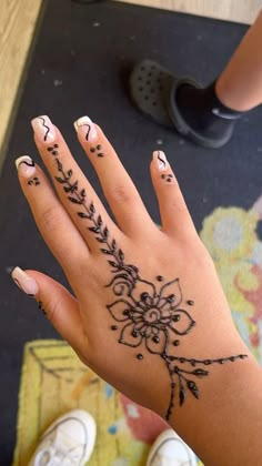 a woman's hand with hendix on it and the word love written in black ink