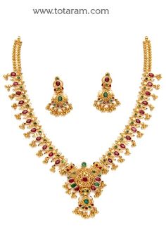 22 Karat Gold Ruby & Emerald Necklace & Drop Earrings Set with intricate workmanship. 
   - 235-GS2034 - in 33.500 Grams for USD $2801.49. 
Made in India by Totaram Jewelers Online this product is in Gold - 22 Karat BIS Hallmark 916 KDM Gold  & is an excellent gift for Adult - Women. Ships fully insured with secured guaranteed delivery for free with your order over $250 from New Jersey USA & comes with 30 days exchange policy. Ruby Emerald Necklace, Indian Gold Jewelry, 22k Gold Necklace, Neck Pieces Jewelry, Pretty Jewelry Necklaces, Necklace Set Indian, 22k Gold Jewelry, Gold Jewelry Simple Necklace, Gold Jewelry Stores