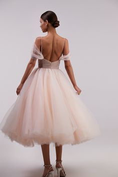 Feminine combination tulle dress with flattering sleeves. Features a peach draped corset with an open back and zipper on the skirt. The plunging neckline is neatly hidden with the decorative insert of transparent mash covered by dozens of sparkling beads. The gown is designed with off-the-shoulder tulle sleeves and tender sparkling tie straps. The A-line midi skirt makes you look elegant and impressive. The dress goes in peach color. Where to wear this feminine midi tulle dress with plunging nec Midi Tulle Dress, Milla Dresses, Draped Corset, Cocktail Dress Code, Tulle Cocktail Dress, Princess Fantasy, Mood Happy, Tulle Sleeves, Floral Dress Formal