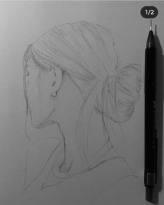 a pencil drawing of a woman's profile