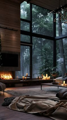 a living room filled with furniture next to a window covered in candles and christmas lights