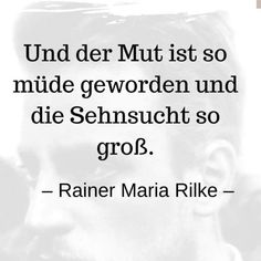 a man with a beard and mustache in front of a quote from raine mania rilke