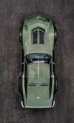 an overhead view of a green sports car